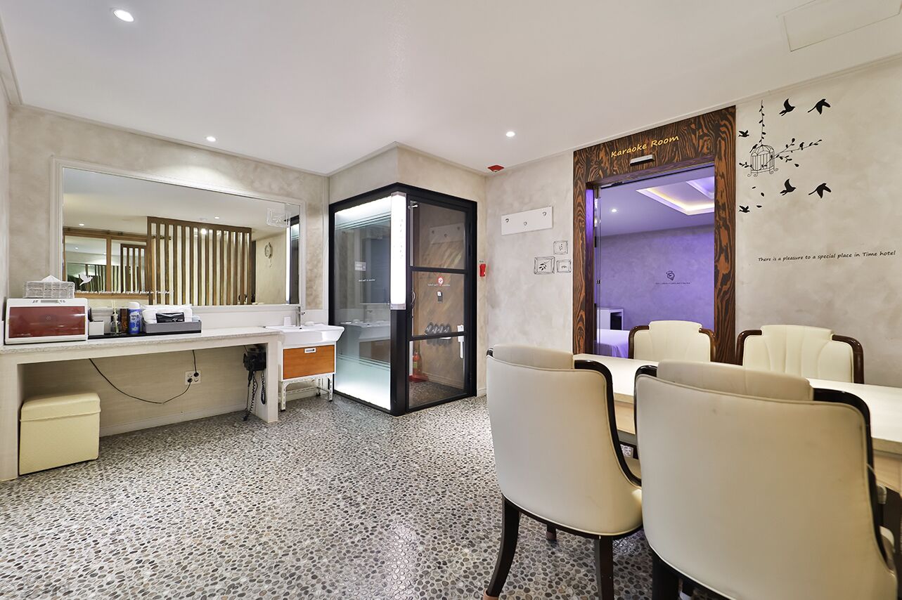 premium suite | premium bedding, desk, laptop workspace, blackout curtains