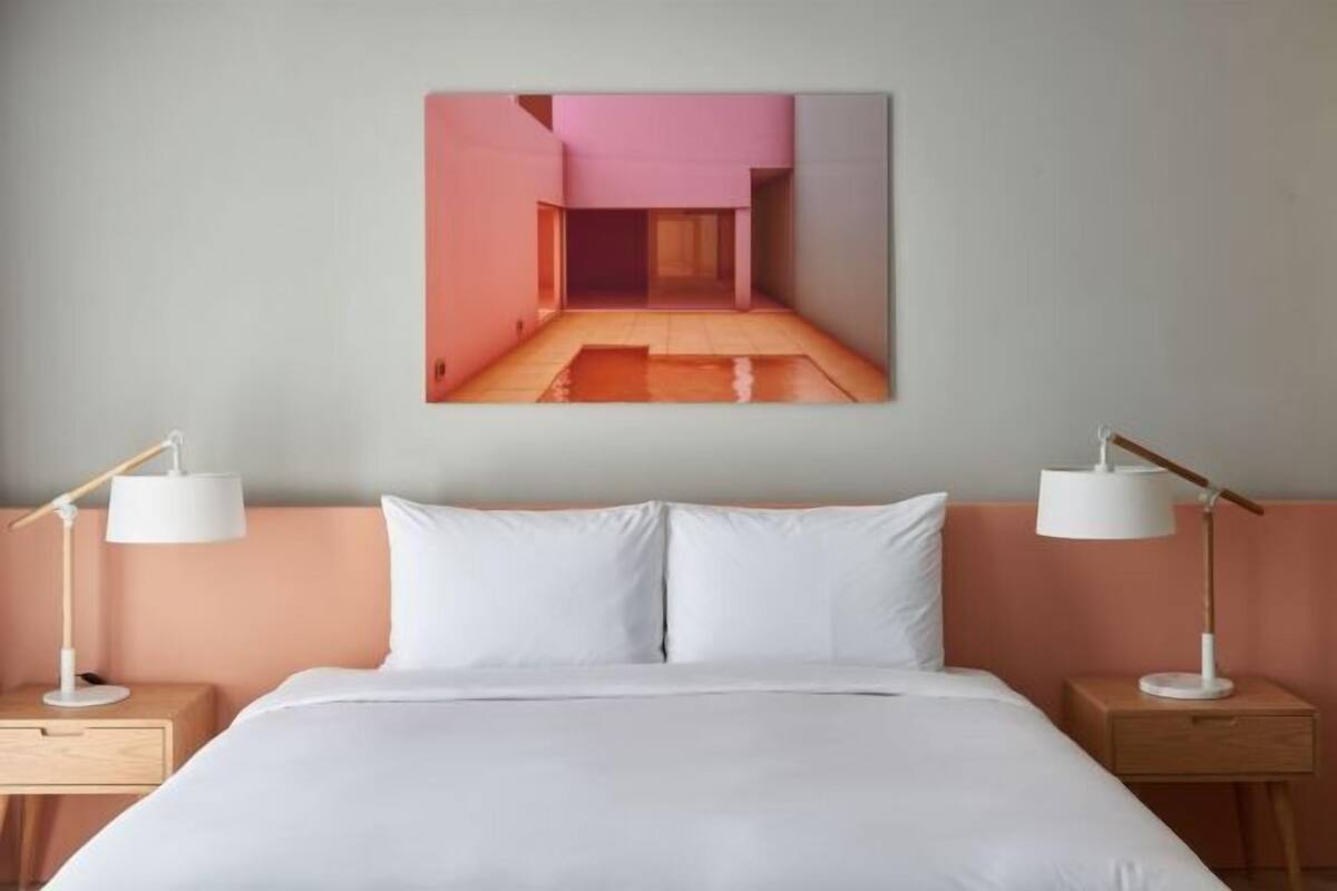 Premium bedding, in-room safe, desk, iron/ironing board (on request)