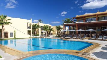 Outdoor pool, pool umbrellas, sun loungers