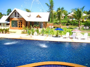 Outdoor pool, pool umbrellas, sun loungers
