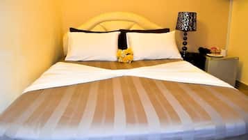 Premium bedding, down comforters, pillowtop beds, minibar