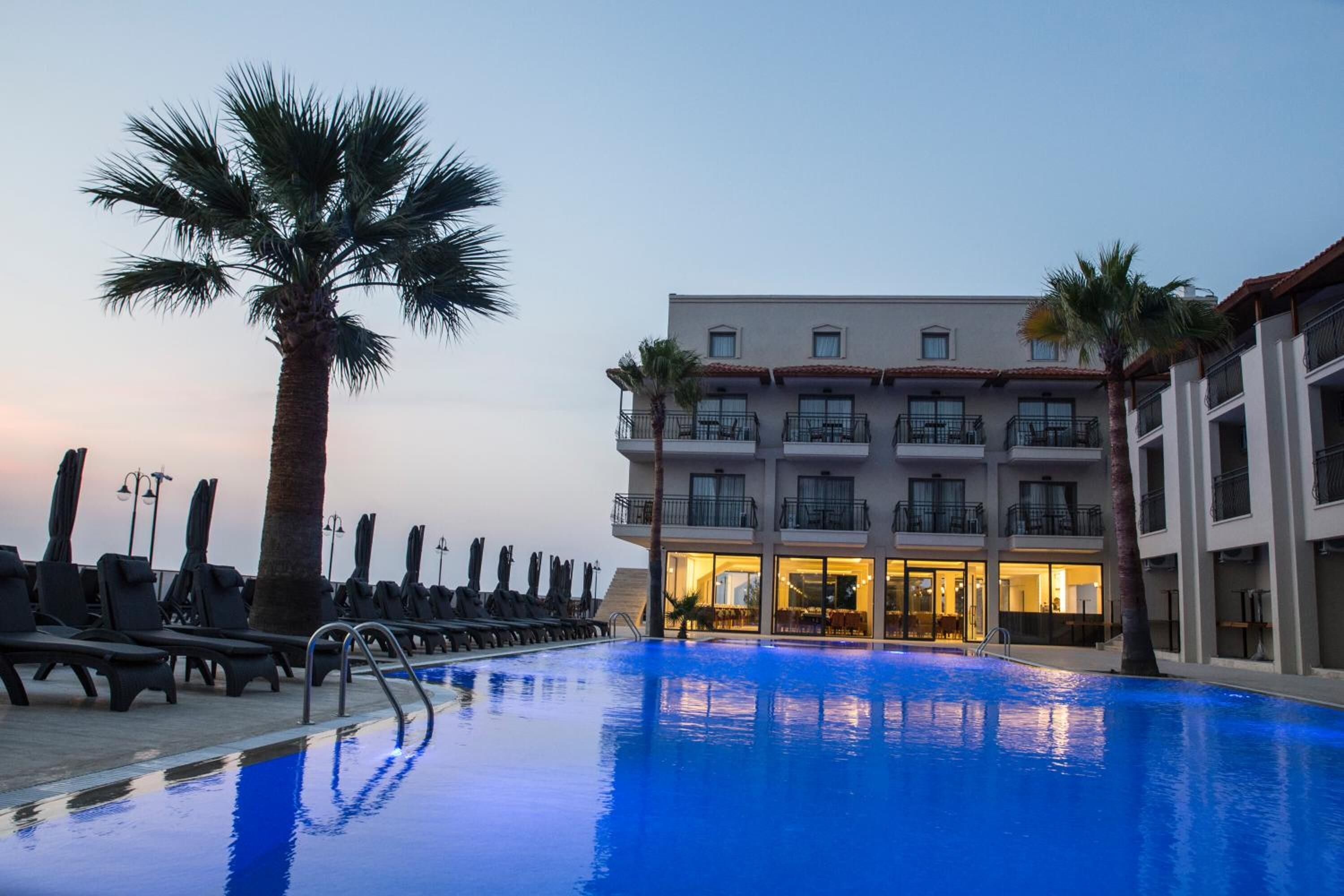 Outdoor pool, pool umbrellas, pool loungers