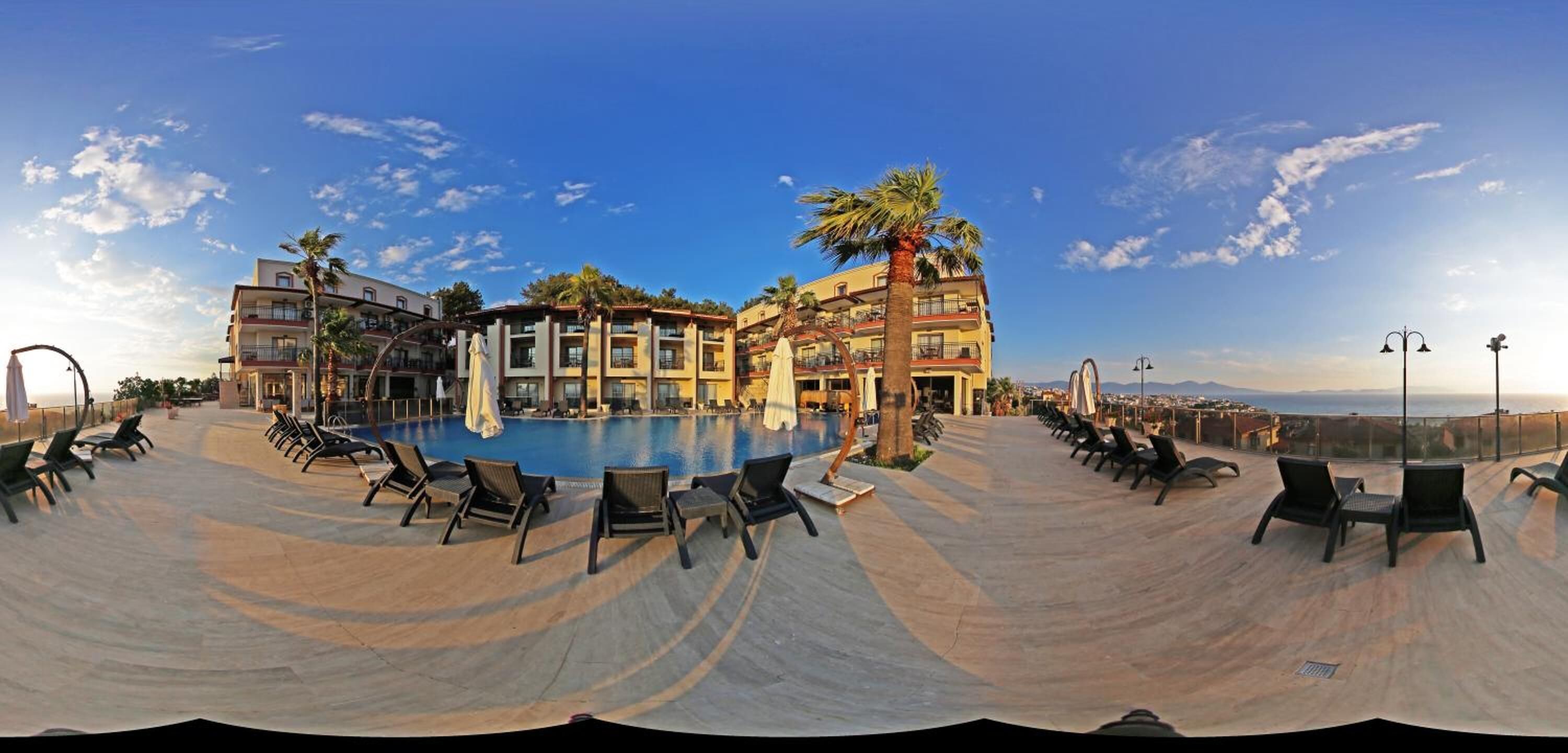 Outdoor pool, pool umbrellas, sun loungers