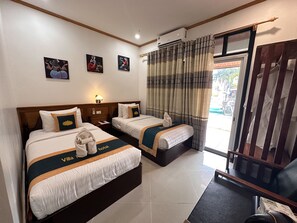 Standard Twin Room | Minibar, caja fuerte, cortinas opacas y wifi gratis