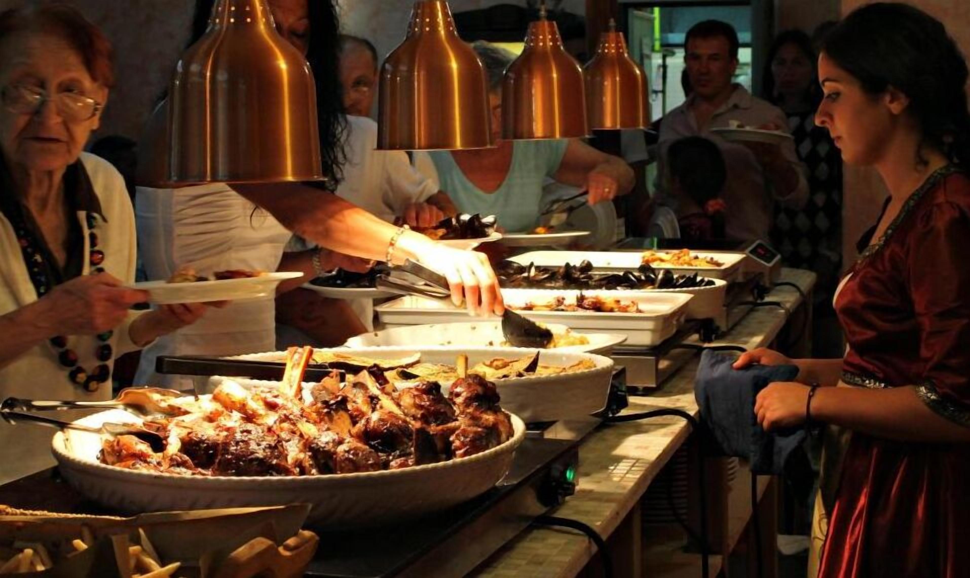 lunch, dinner served; local cuisine, al fresco dining