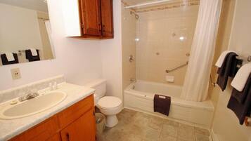 Room, 2 Double Beds | Bathroom | Combined shower/bathtub, hair dryer