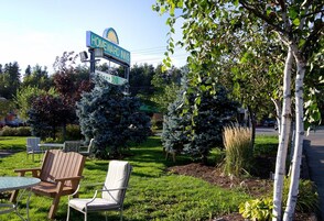 A sign for Homeward Inns with a 60-minute drive to the city.