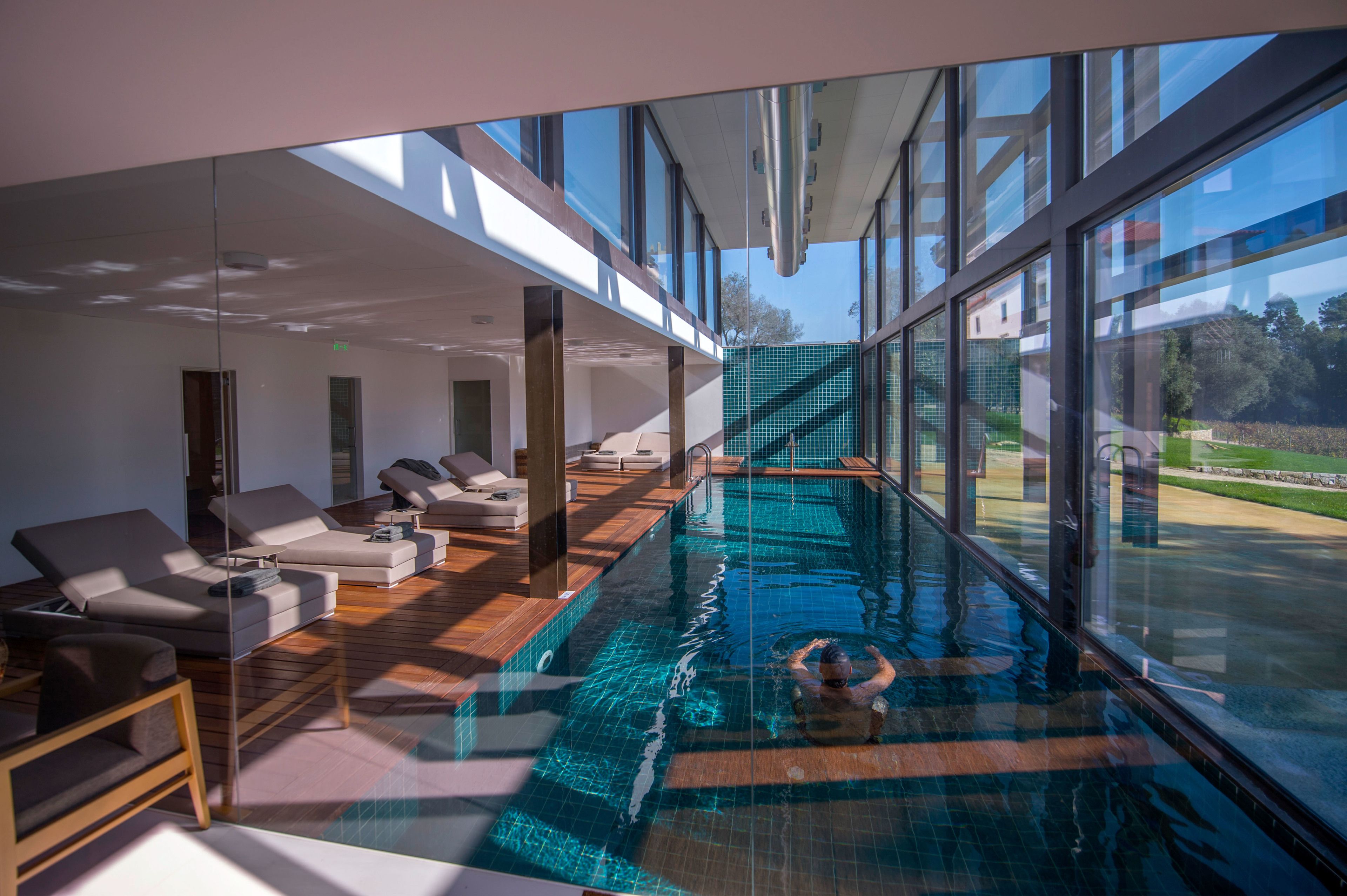indoor pool, seasonal outdoor pool, pool loungers