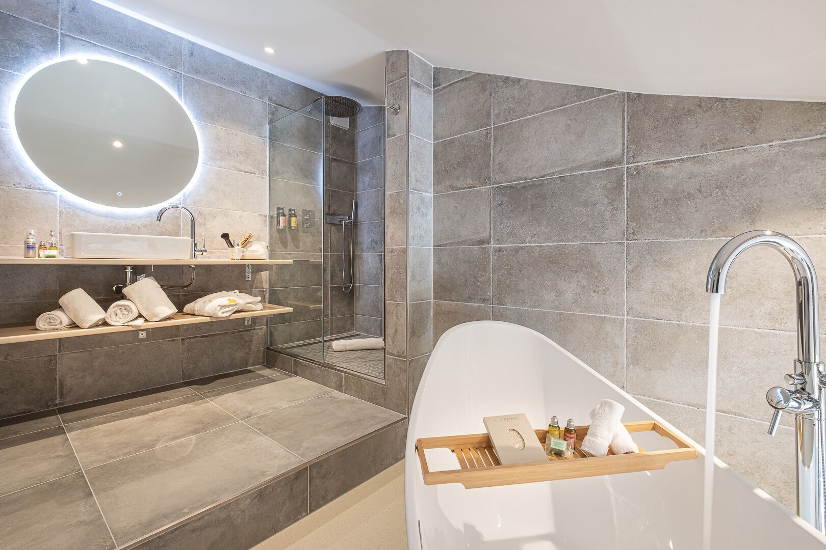 duplex family room | bathroom | shower, free toiletries, towels