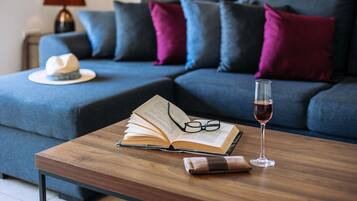 Standard Apartment, 1 Bedroom, Balcony | Living area | 32-inch flat-screen TV with satellite channels, TV