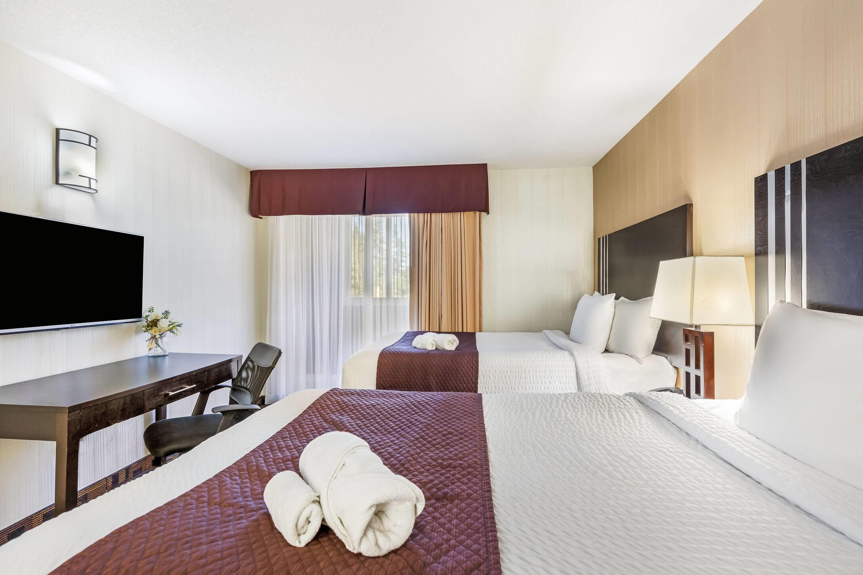 Quarto, 2 camas de casal, para não fumantes | Escrivaninha, ferros/tábuas de passar roupa, Wi-Fi de cortesia