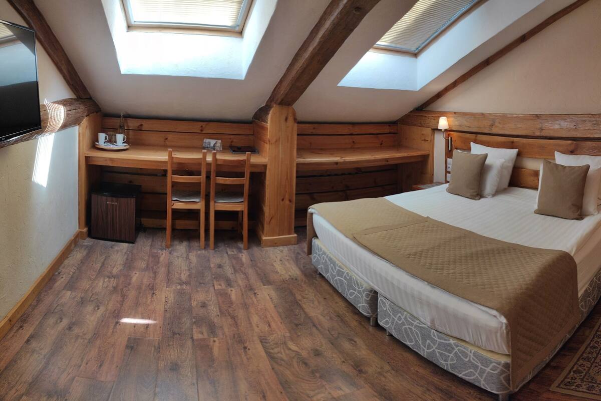 Superior Double Attic Room | 1 bedroom, in-room safe, individually decorated, individually furnished