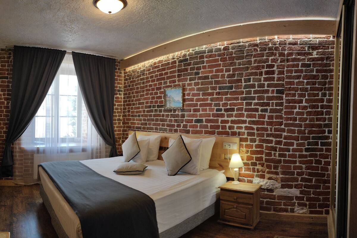 Junior Suite | 1 bilik tidur, peti besi dalam bilik, dihias secara berasingan