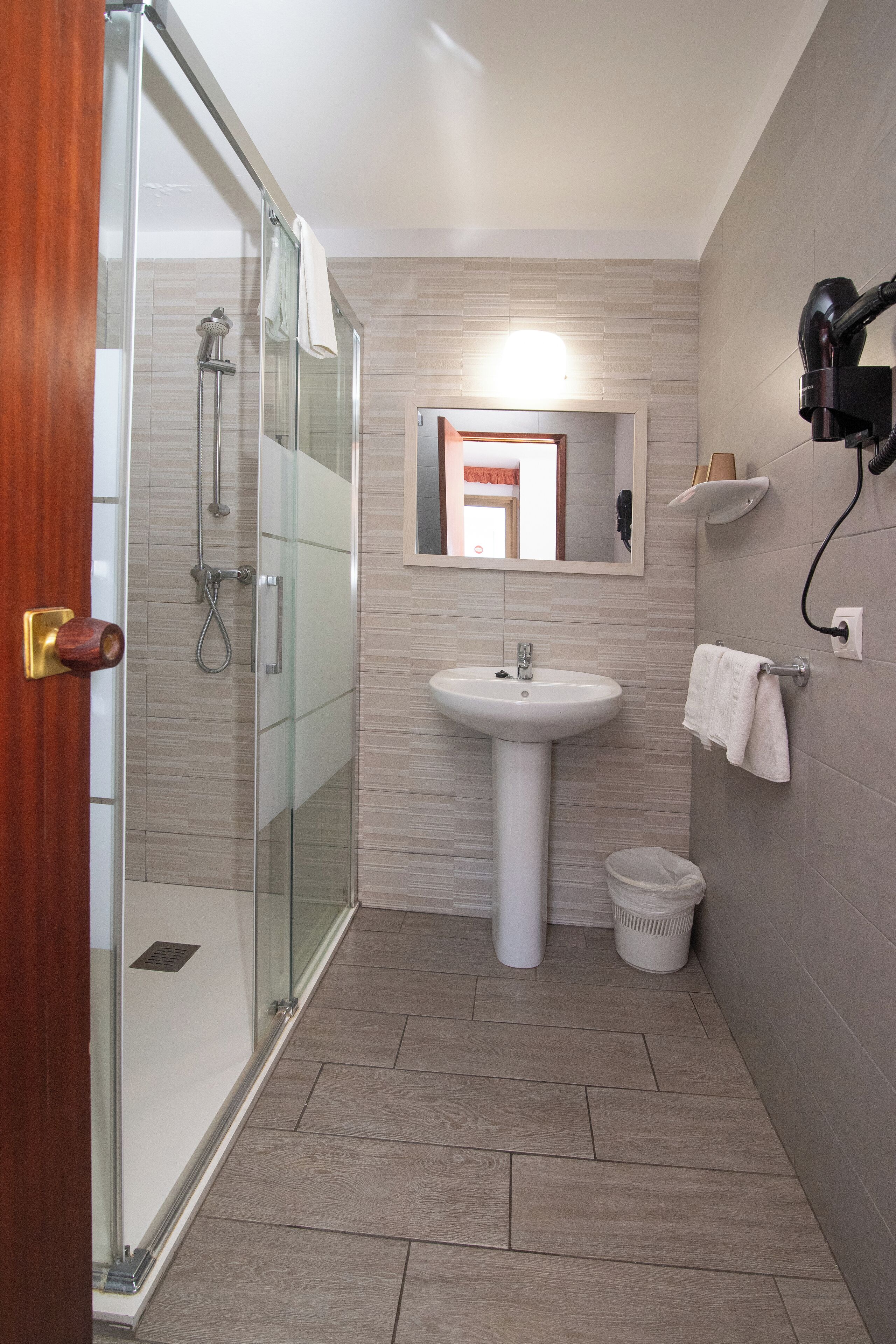 Shower, free toiletries, hair dryer, towels