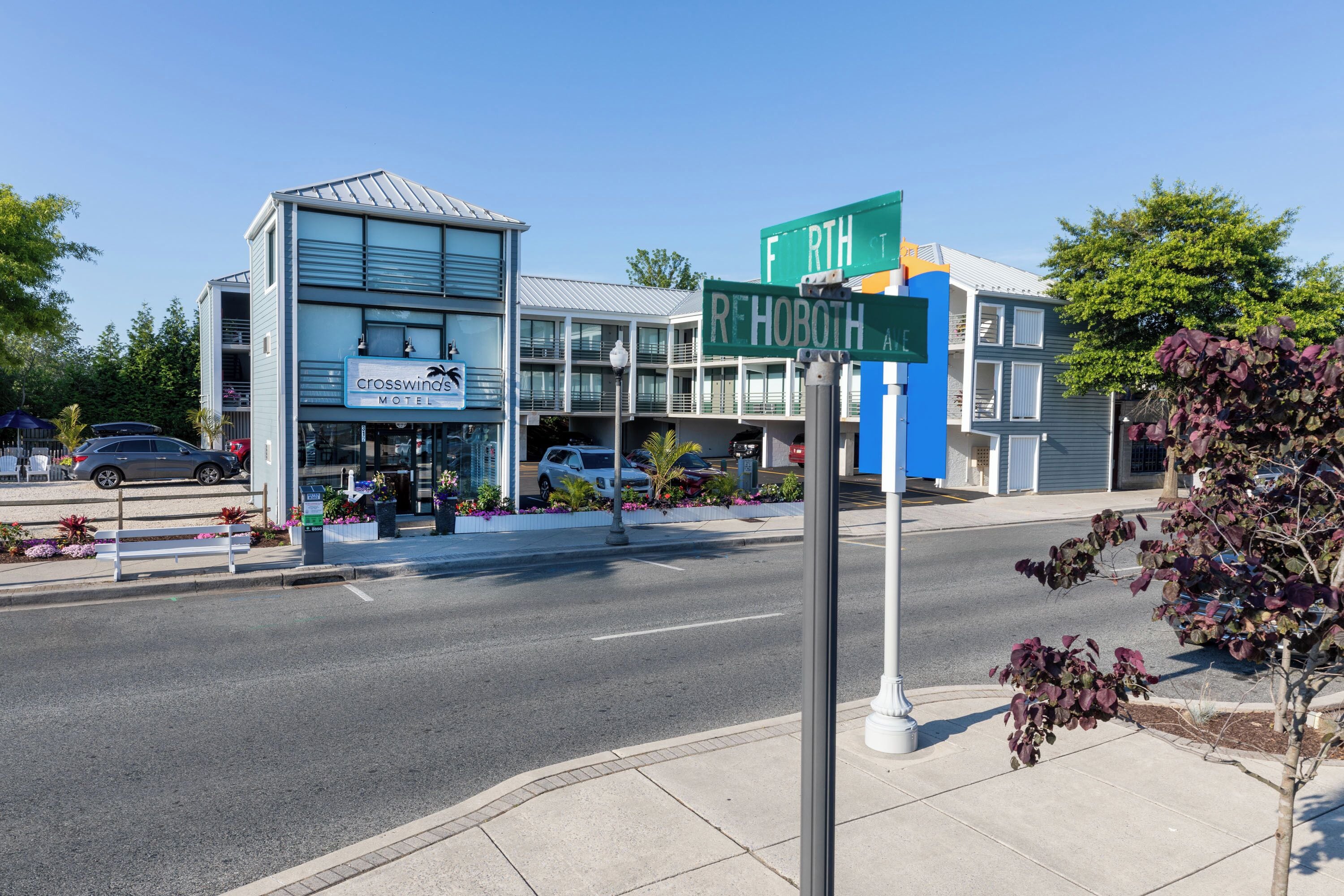 A motel with a modern design, located at the intersection of Forth St and Rehoboth Ave.