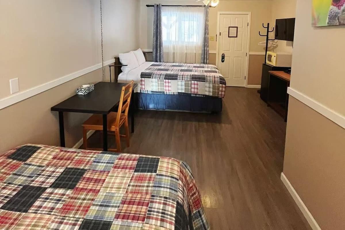 Economy Quadruple Room | Premium bedding, desk, free WiFi, bed sheets