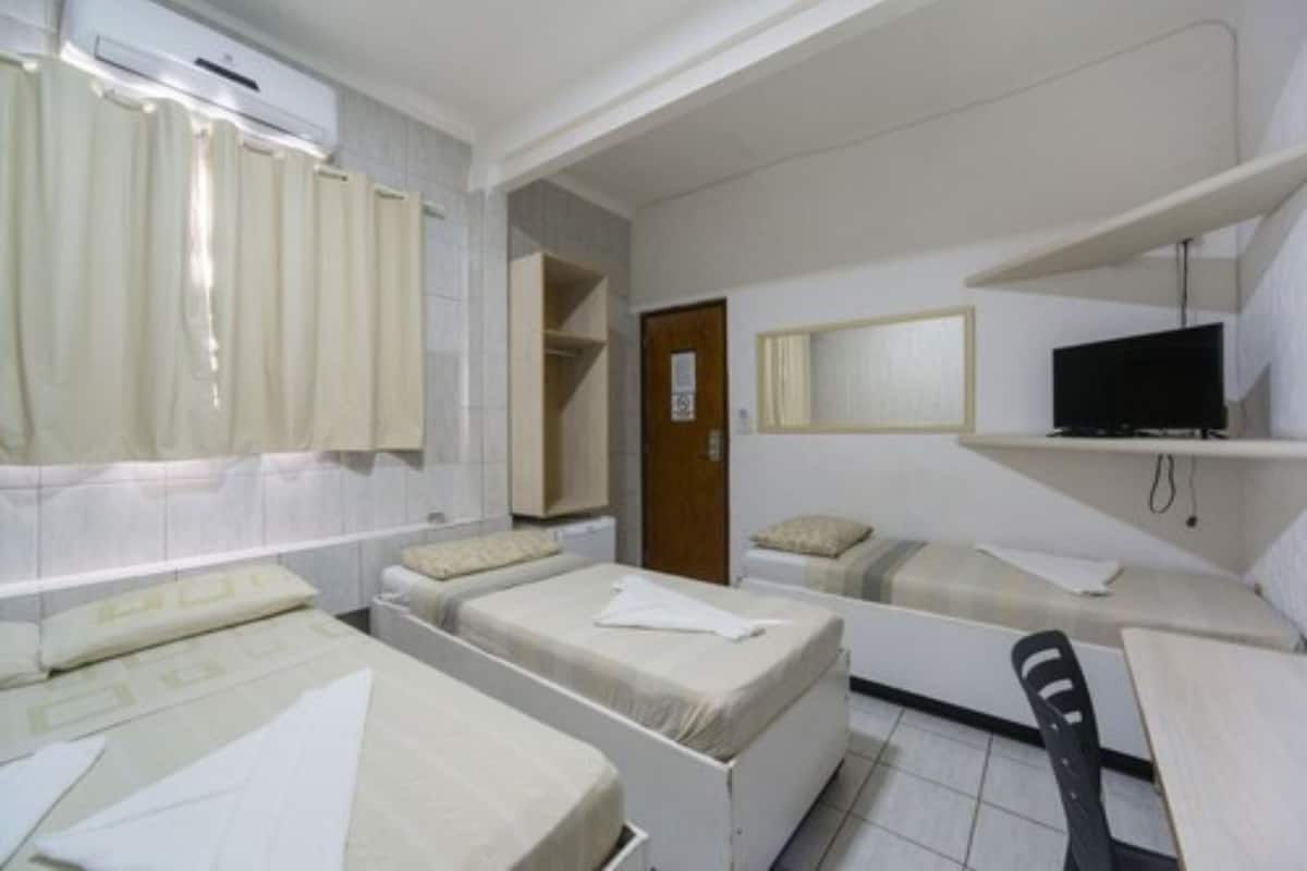 Quadruple Room | Minibar, desk, WiFi (free), bed sheets
