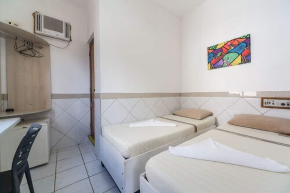Twin Room | Minibar, desk, WiFi (free), bed sheets