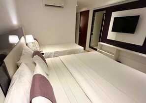 Standard Triple Room | Minibar, in-room safe, individually furnished, desk - Nord Luxxor Sapucaia (João Pessoa)