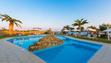 Outdoor pool, pool umbrellas, pool loungers