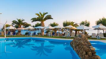 Outdoor pool, pool umbrellas, pool loungers