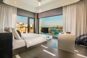 Suite, 1 King Bed, Balcony | In-room safe, desk, blackout drapes, soundproofing - SUN & MOON, Urban Hotel (Phnom Penh)