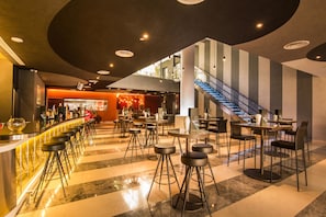 3 bars/lounges, lobby lounge, rooftop bar