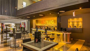 3 bars/lounges, lobby lounge, rooftop bar
