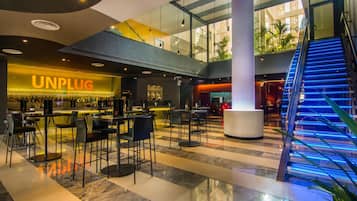 3 bars/lounges, lobby lounge, rooftop bar