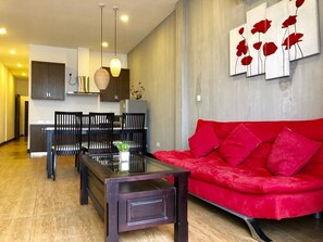 Luxury Apartment, 1 Bedroom, River View | Living area | 32-inch LCD TV with cable channels, TV, DVD player - Asiban Quay Boutique Hotel (Phnom Penh)
