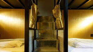 A bunk bed room with a metal staircase and wooden walls. - Angels' Hostel - Taipei Ximen (Taipei)