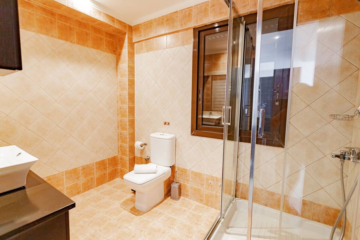 junior room, sea view | bathroom | shower, free toiletries, hair dryer, towels