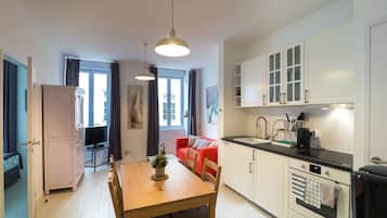 Comfort Studio, City View, Courtyard Area | Living area | Flat-screen TV, DVD player