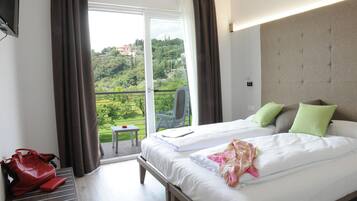 Junior Suite, Balcony | In-room safe, desk, soundproofing, cribs/infant beds