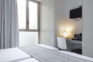 Premium bedding, down duvets, minibar, in-room safe