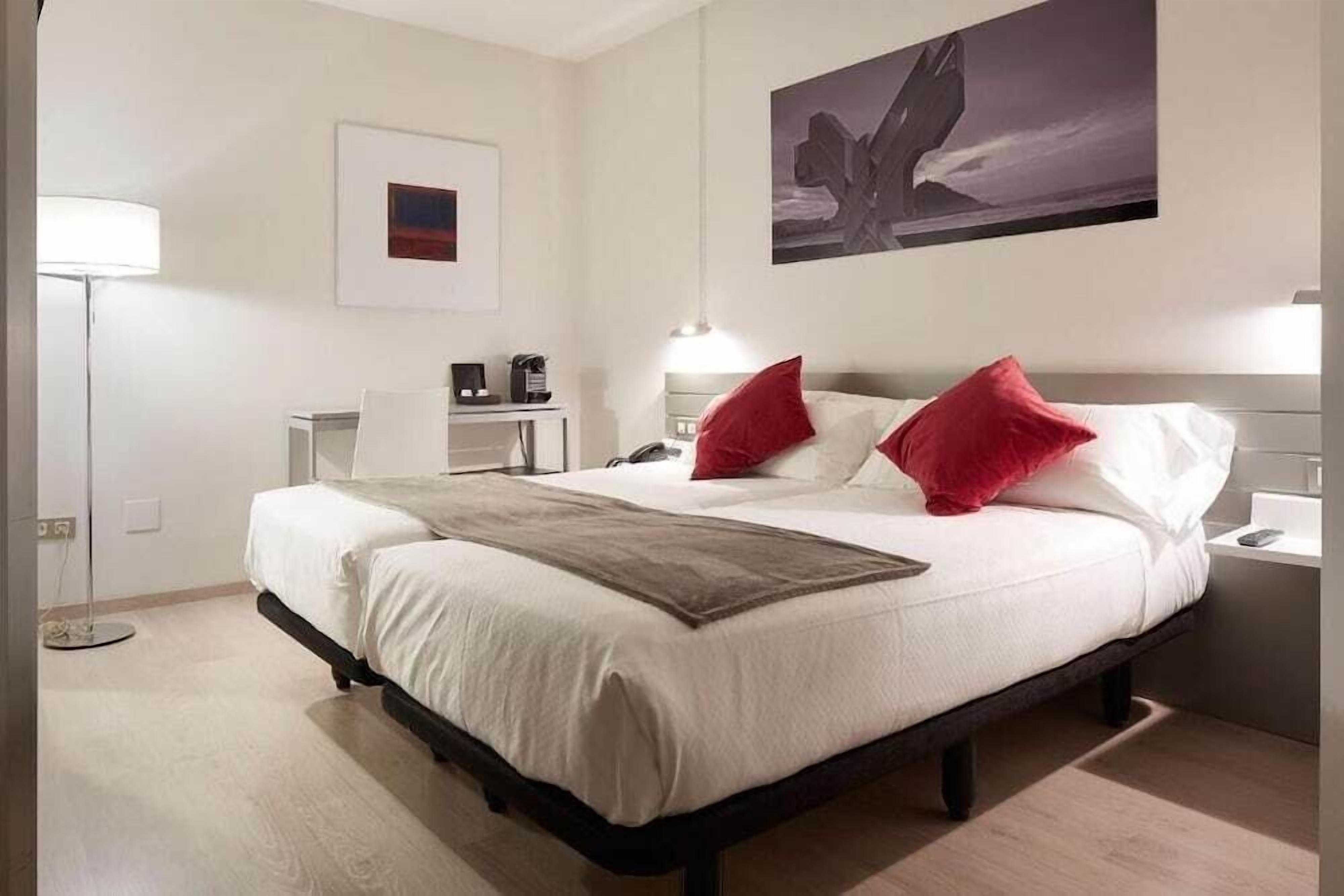 premium bedding, down duvets, minibar, in-room safe