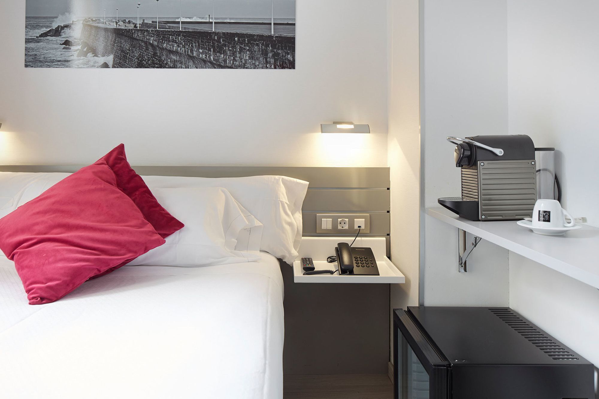 premium bedding, down duvets, minibar, in-room safe