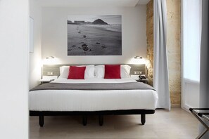Premium bedding, down duvets, minibar, in-room safe