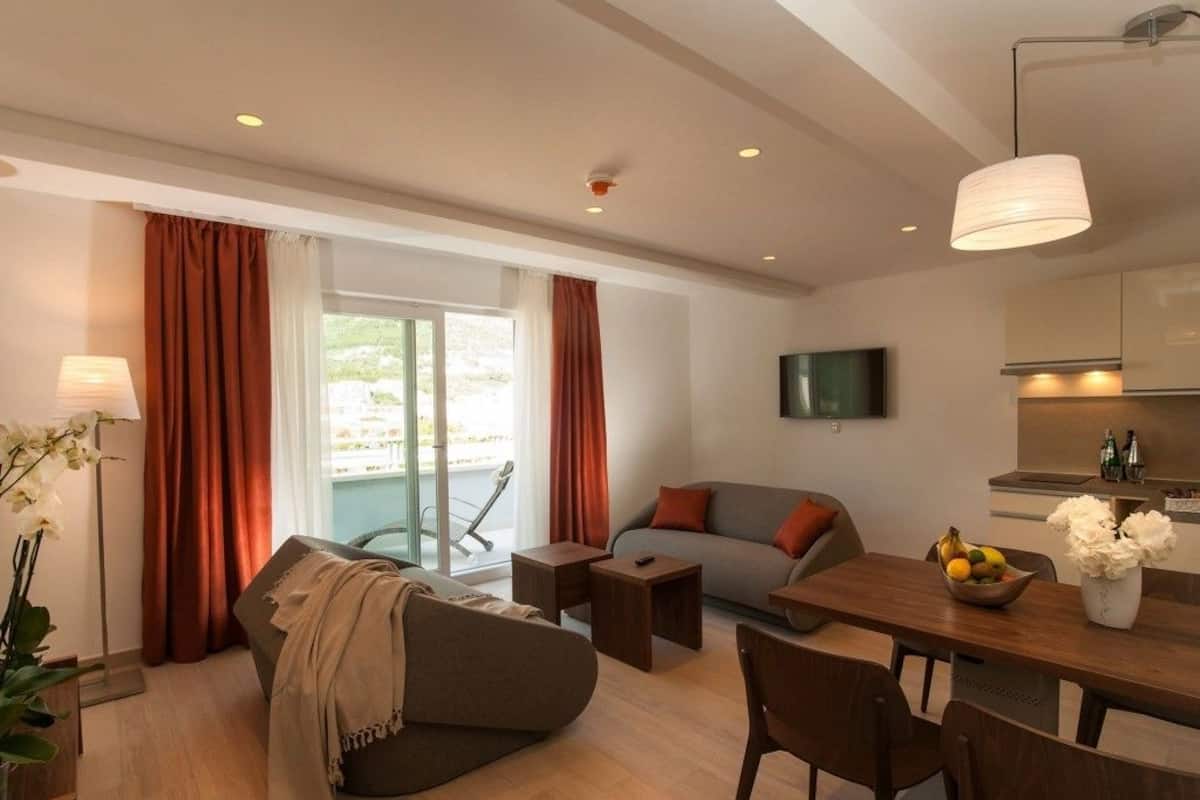 Apartment, 1 Bedroom, Balcony, Park View | Living area | Flat-screen TV