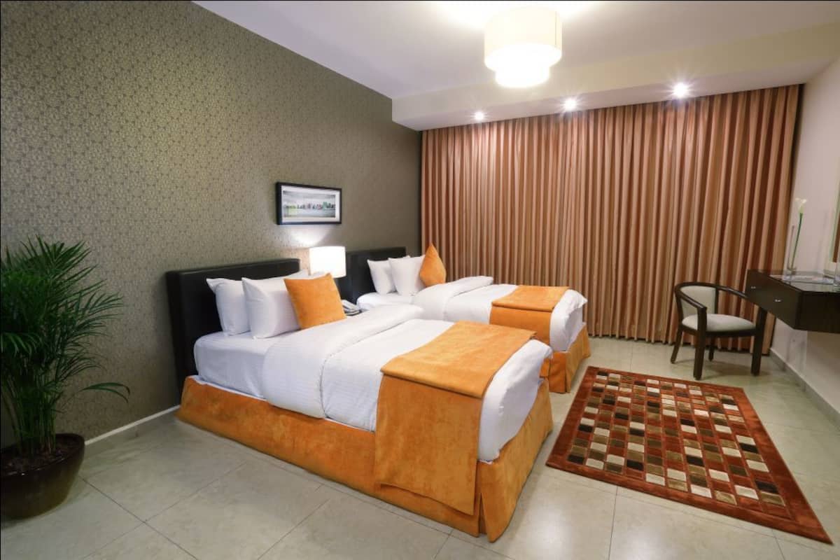Suite, 2 slaapkamers, uitzicht op stad | 1 slaapkamer, luxe beddengoed, een kluis op de kamer