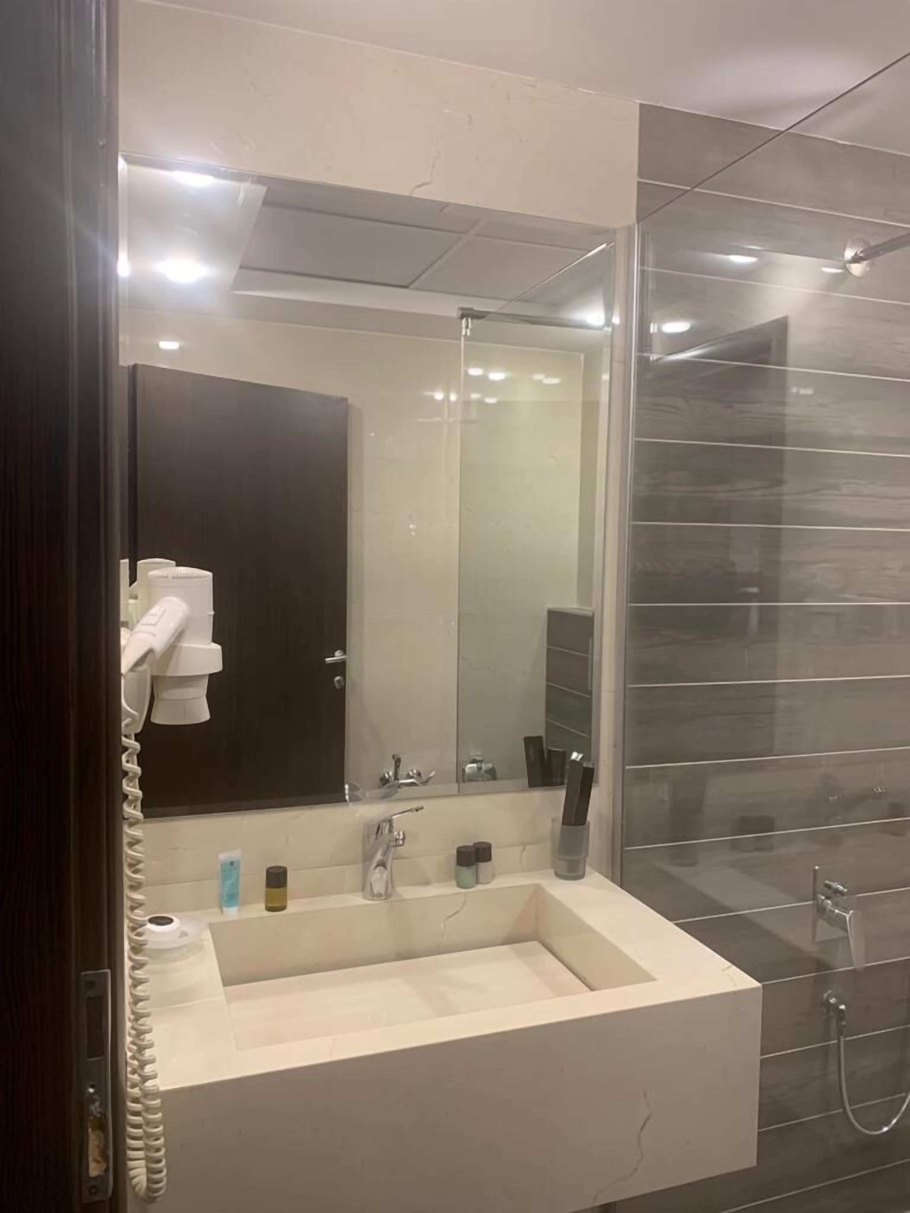 royal quadruple room | bathroom | shower, free toiletries, hair dryer, bathrobes