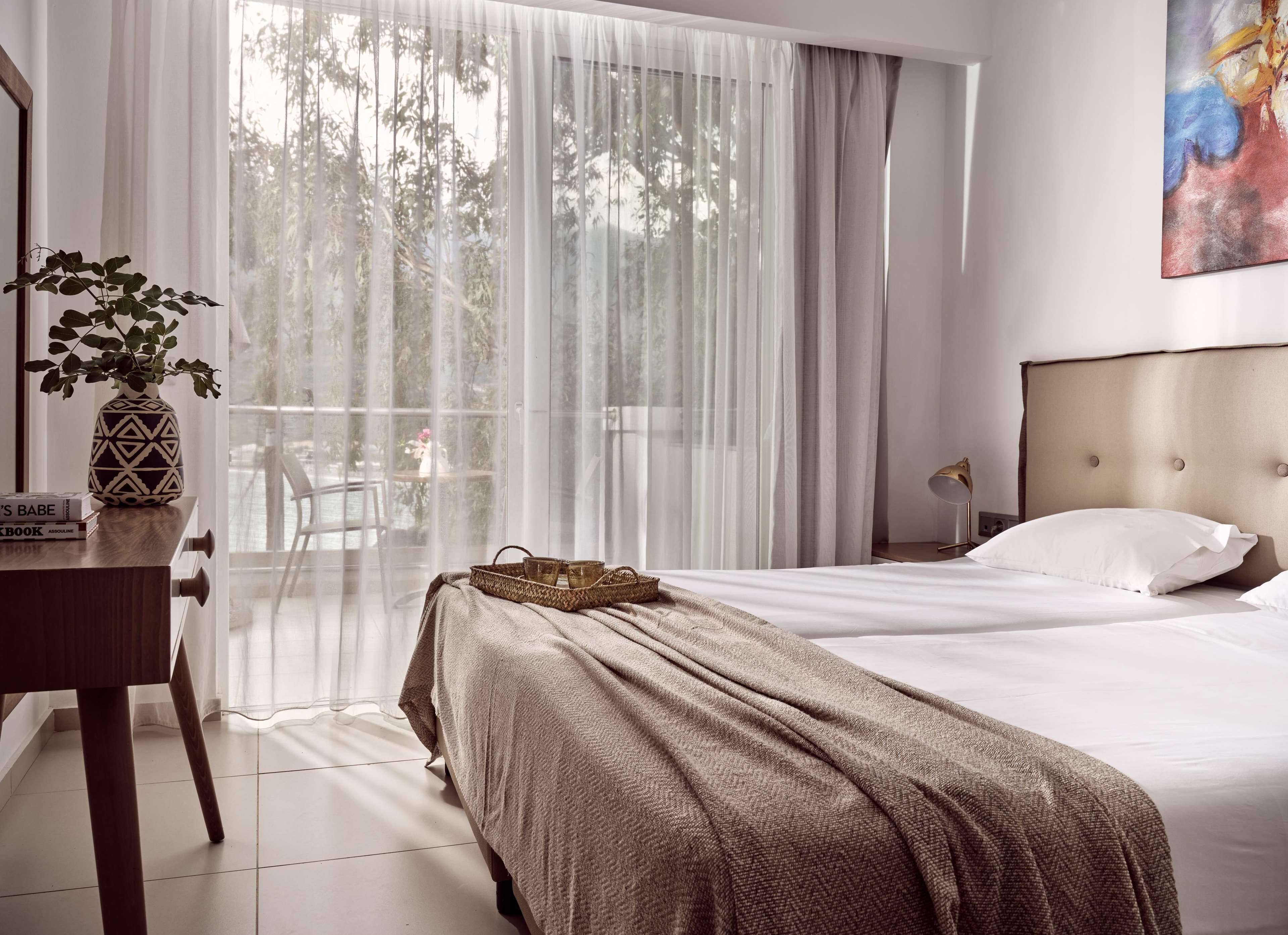 Deluxe Apartment, Sea View | In-room safe, soundproofing, iron/ironing board, bed sheets