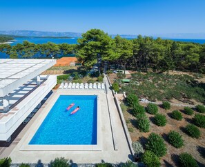 Outdoor pool, sun loungers