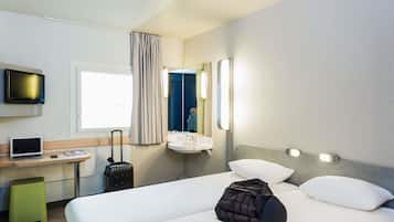 Chambre avec lits jumeaux, 2 lits une place | Bureau, chambres insonorisées, Wi-Fi gratuit, draps fournis