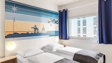 Twin kamer | Een bureau, geluiddichte muren, gratis wifi, beddengoed