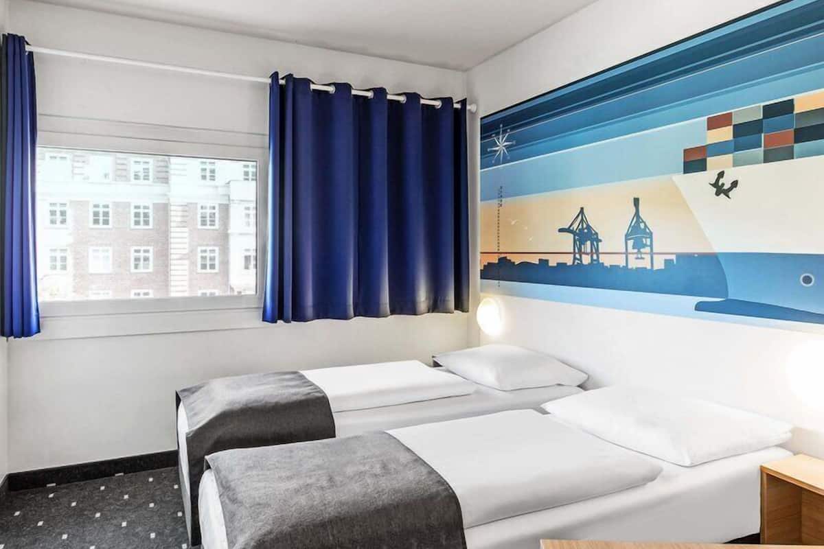 Twin kamer | Een bureau, geluiddichte muren, gratis wifi, beddengoed