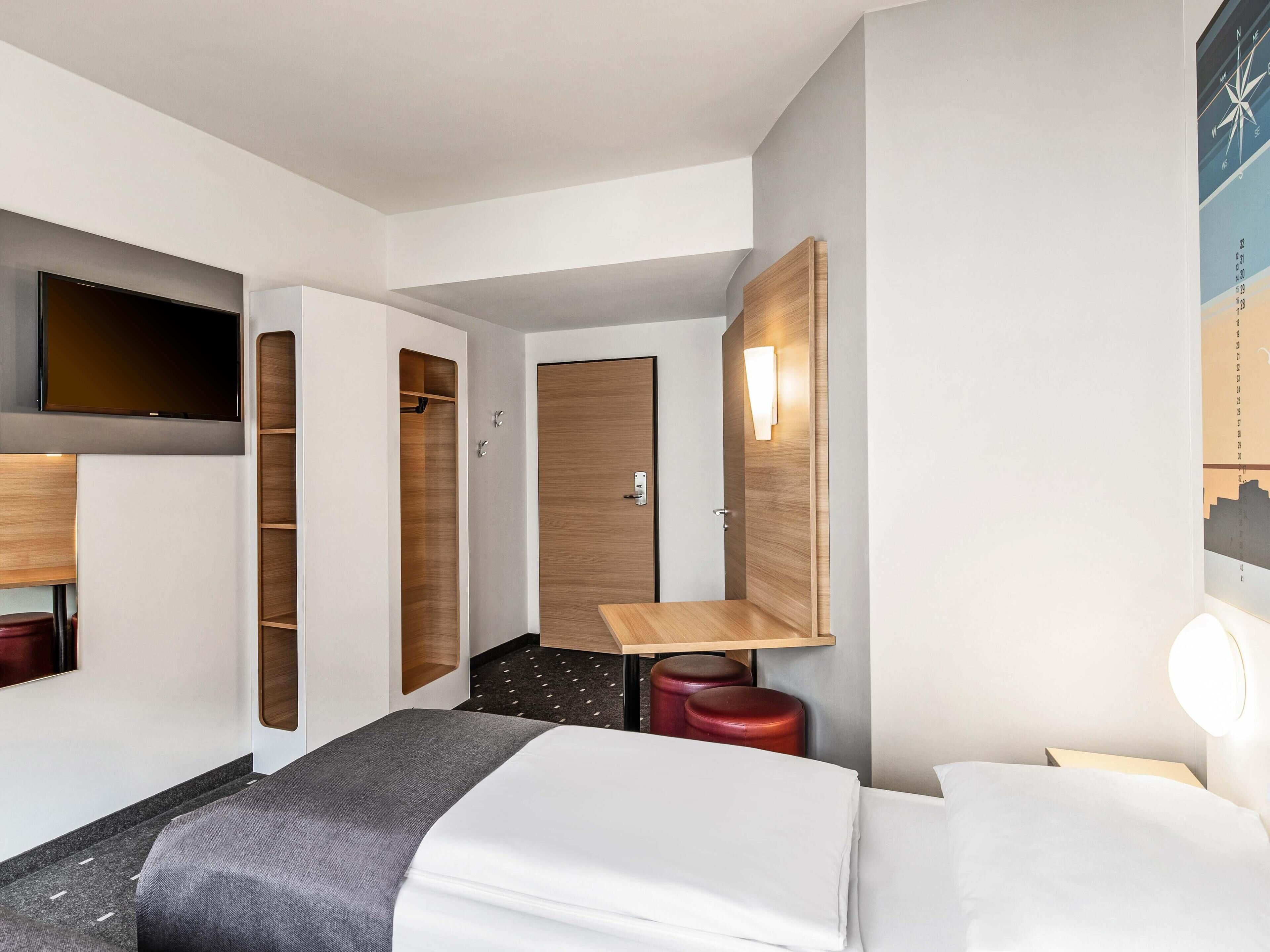 Habitación con 2 camas individuales | Escritorio, sistema de insonorización, wifi gratis y ropa de cama