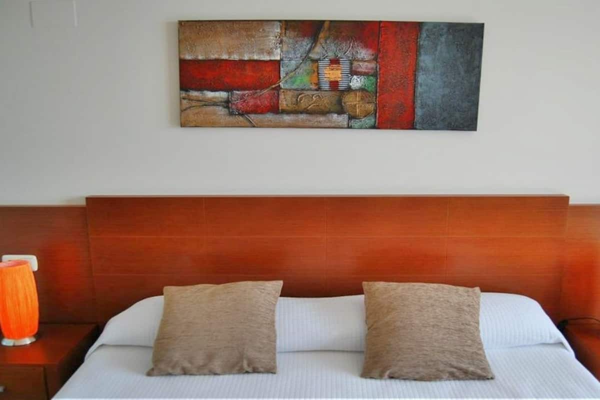 Apartment, 1 Bedroom, City View | Iron/ironing board, WiFi (free), bed sheets