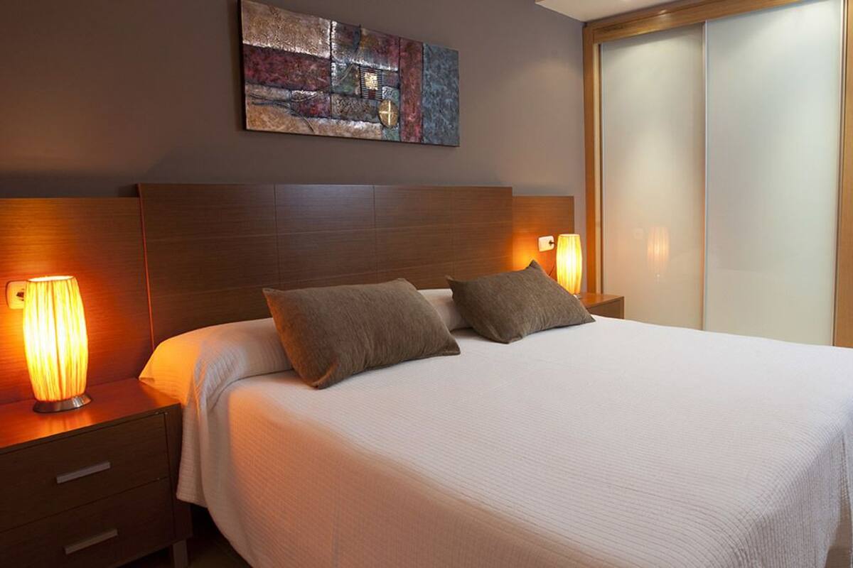 Apartment, 3 Bedrooms, City View | Iron/ironing board, WiFi (free), bed sheets