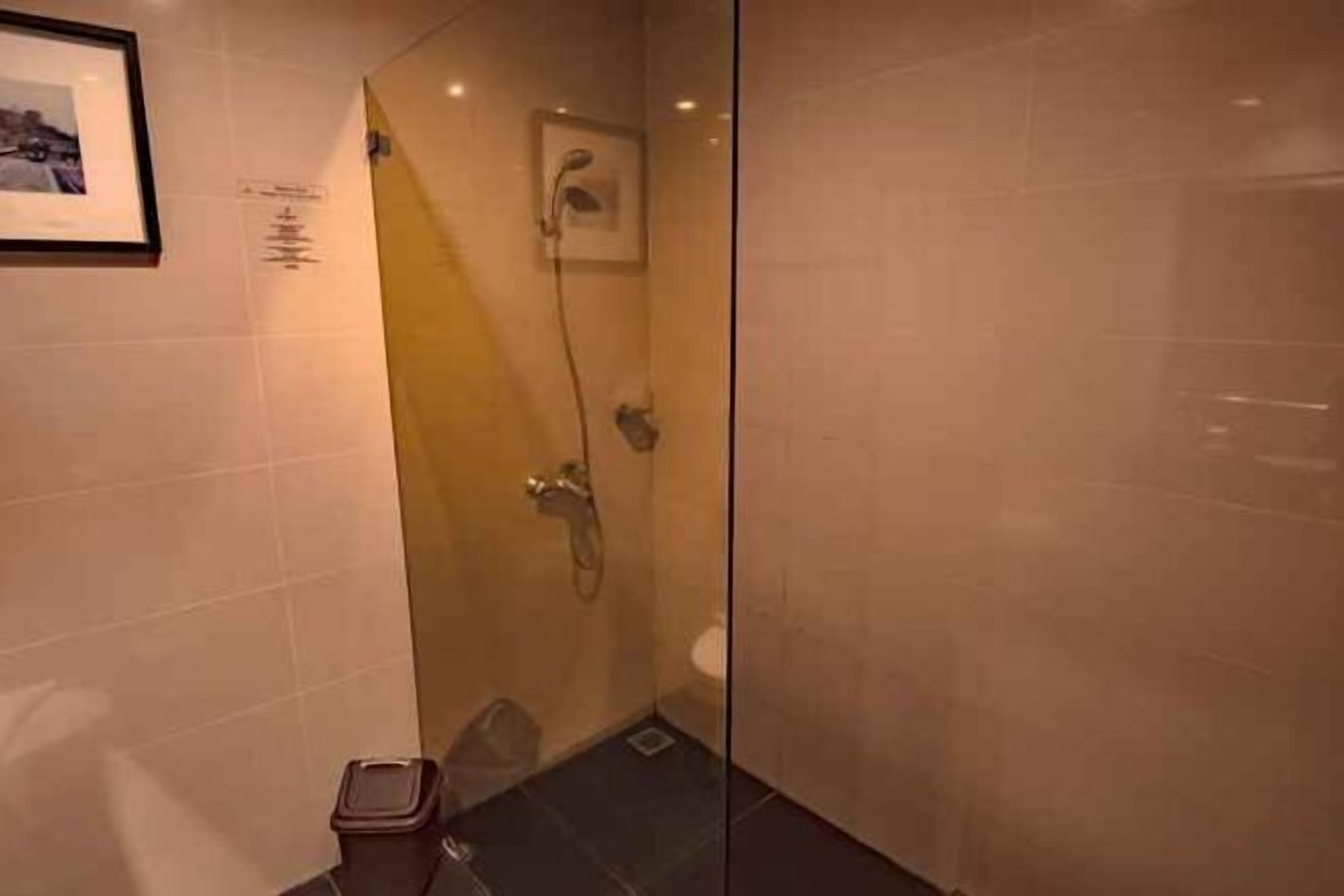 Bathroom | Shower, free toiletries, slippers, towels